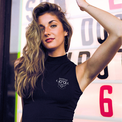 Women luxury streetwear fashion featuring REALLY COOL high-neck sleeveless top with embroidered logo