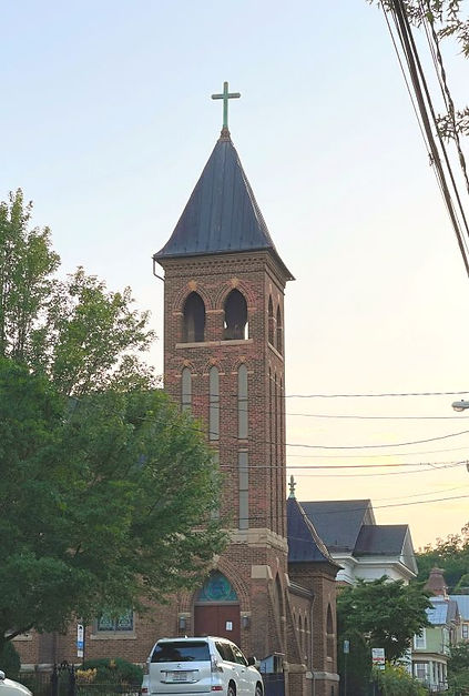 A grand picture of Emmanuel's historic church belltower