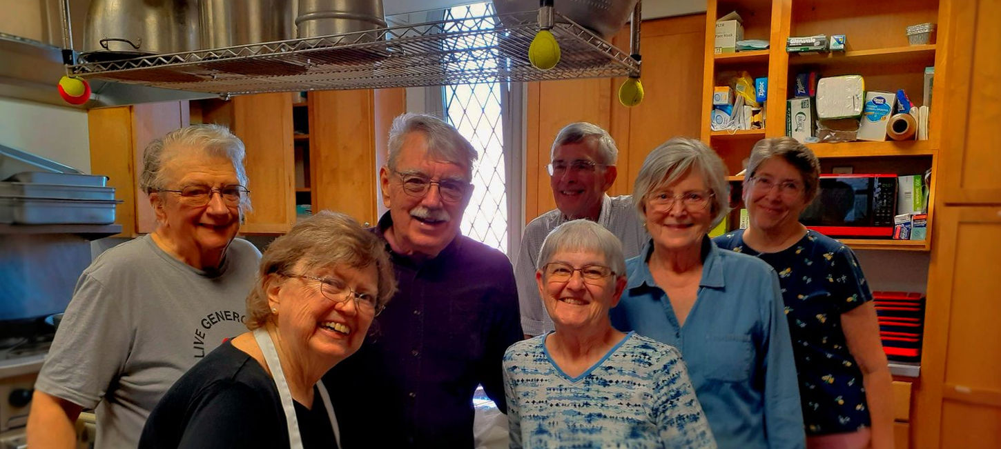 Members of Emmanuel Episcopal Church smiling welcomingly