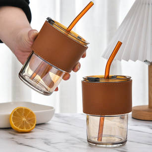 Glass straw coffee cup with leather cup holder, glass straw coffee cup, coffee cup with leather cup holder, coffee cup with cup holder, straw coffee cup, straw cup, coffee cup, cup, straw, leather cup holder, cup holder, leather, company gift, corporate gift, glass gift, gift