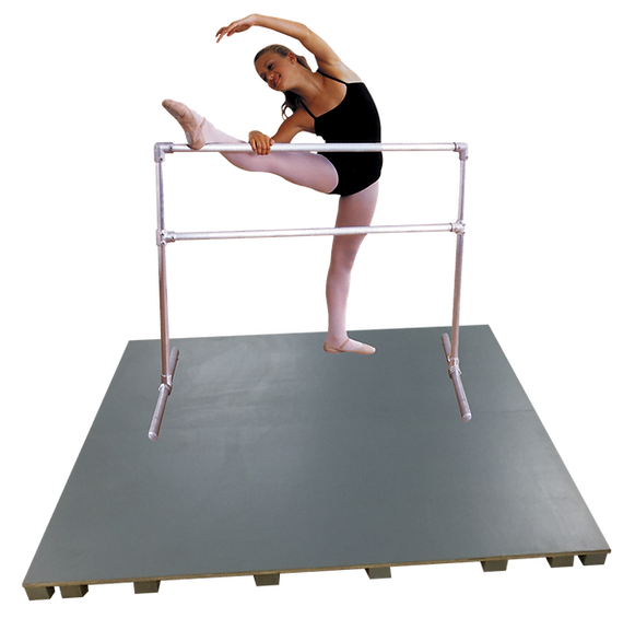 Ballet dancer practicing on a Gerstung Home Sprung Folding Floor Ballet Barre combo