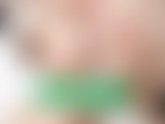 Woman receiving a facial treatment, eyes closed, in a spa setting. Text: "Natural Skincare," "Dr. Lazuk Cosmetics," "Dr. Lazuk Esthetics."