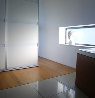 view of dressing area and architectural bathroom