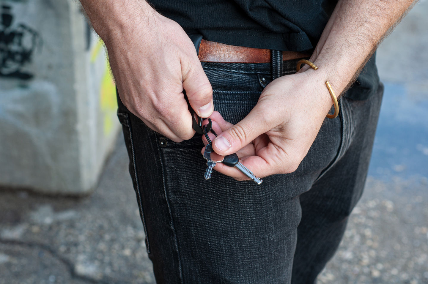 Tactical TOOB Keychain in models hands