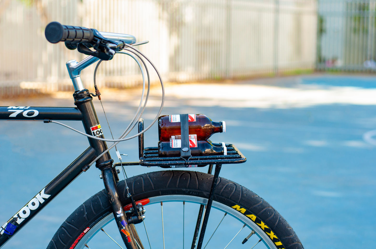 TOOB Mini Strap on bicycle rack holding beers