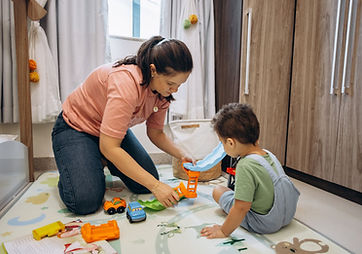 BCBA therapist working with child.jpg