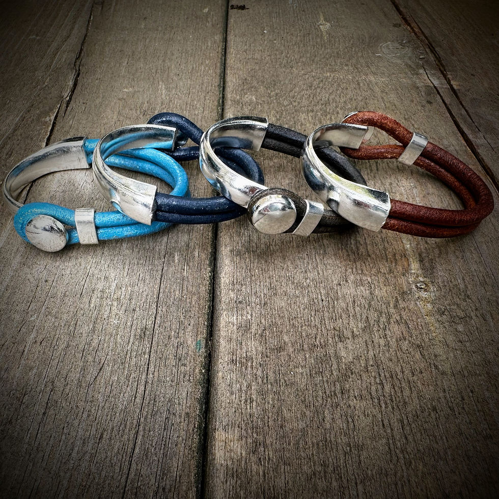 Thumbnail: Round leather and silver plate rounded button hook bracelets