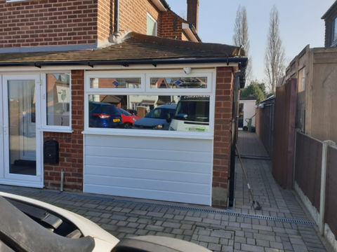 Newly installed tiles and brand-new white window frames