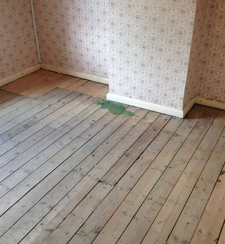 lose-up view of a room after house clearance, showing empty space and clean surfaces