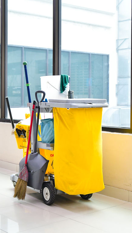 Yellow mop bucket and set of cleaning equipment