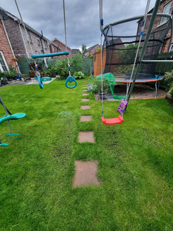 A swing set in a backyard