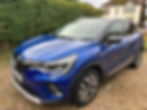 Blue Renault Kadar parked on the roadside