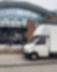 Side view of a white coloured moving van