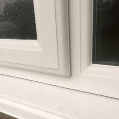 Close-up view of a corner of a window