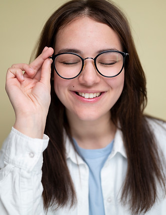 front-view-woman-wearing-glasses-studio.jpg