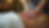 Close-up view of massage therapist applying deep tissue pressure on a client's back