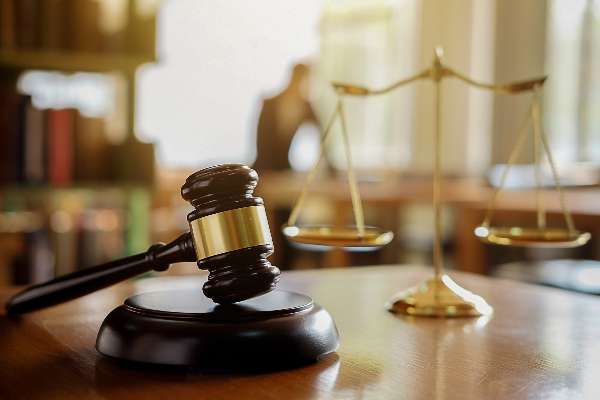Gavel and scales of justice on a table