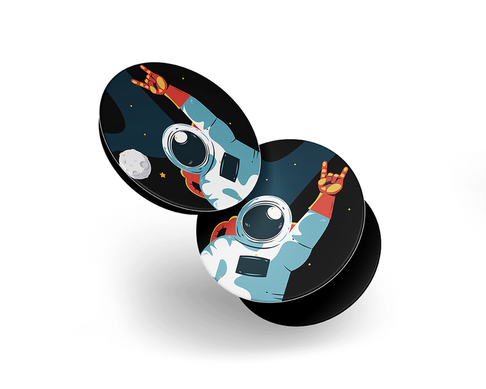 Two Pop Sockets with astronaut making rock gesture in space.
