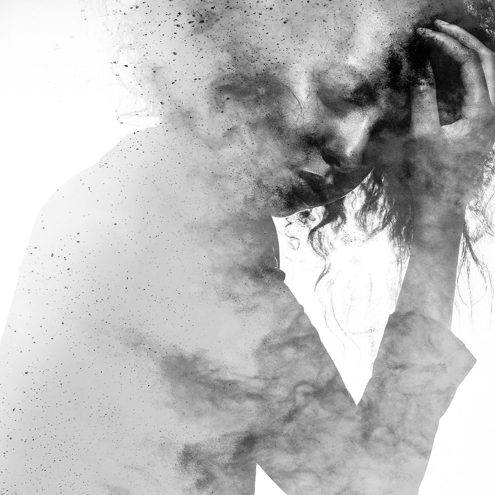 Black woman holding her head in a foggy atmosphere.