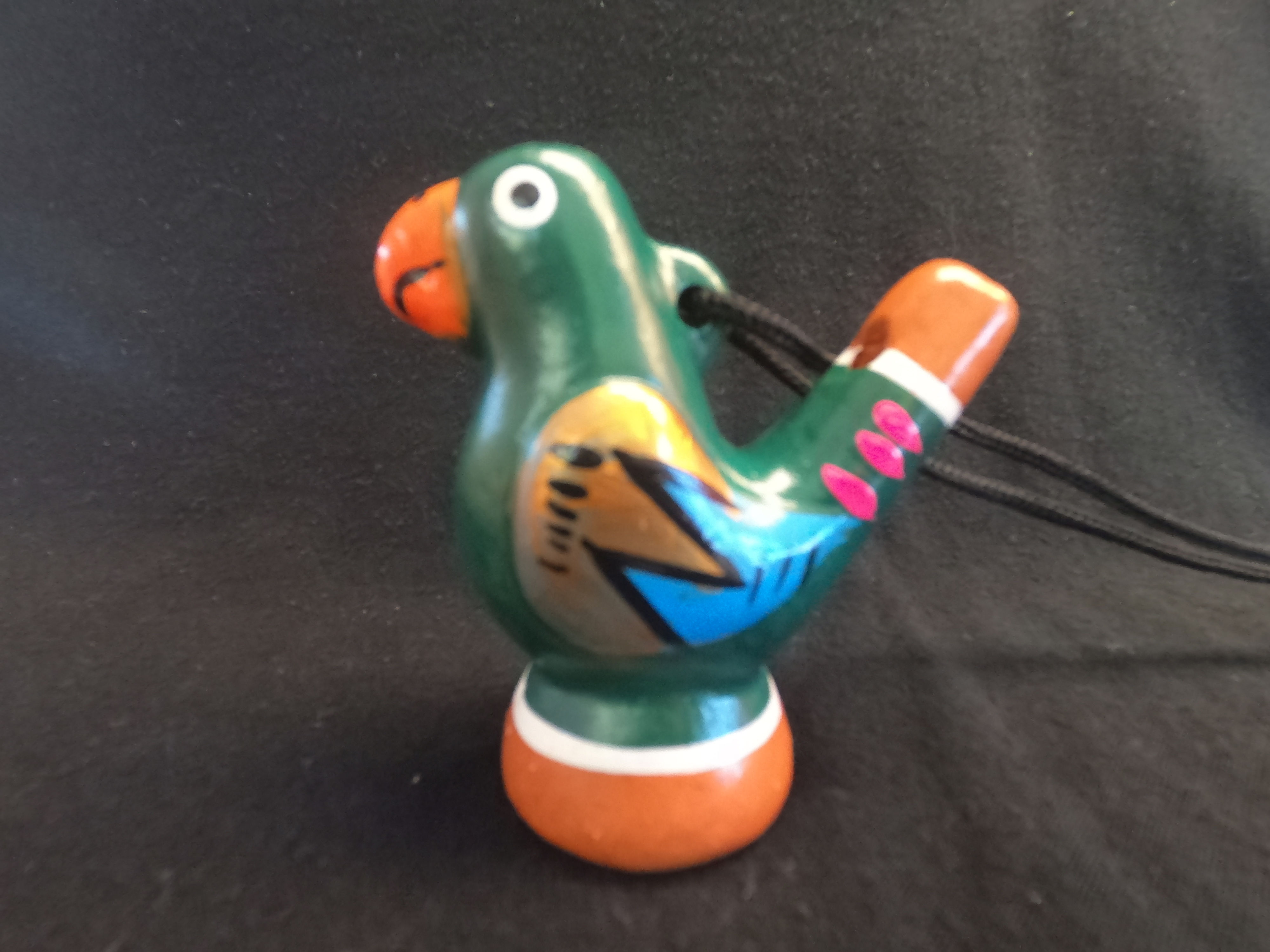 Silbato de agua pájaro -Loro