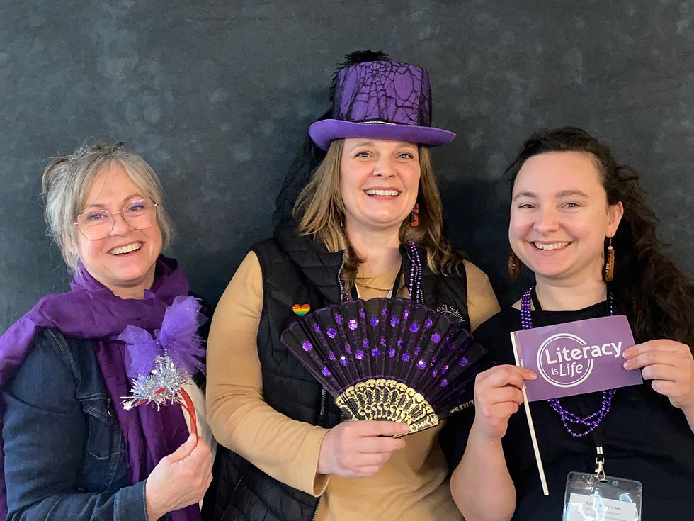 Jeanne, Jessica and Kelly joined in on a 'purple for literacy' themed photo session at the Decoda Literacy Conference.