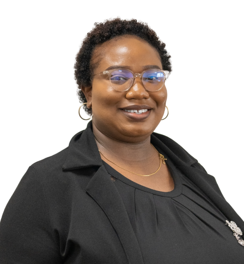 Smiling woman with long dark hair wearing patterned jacket over a black shirt.