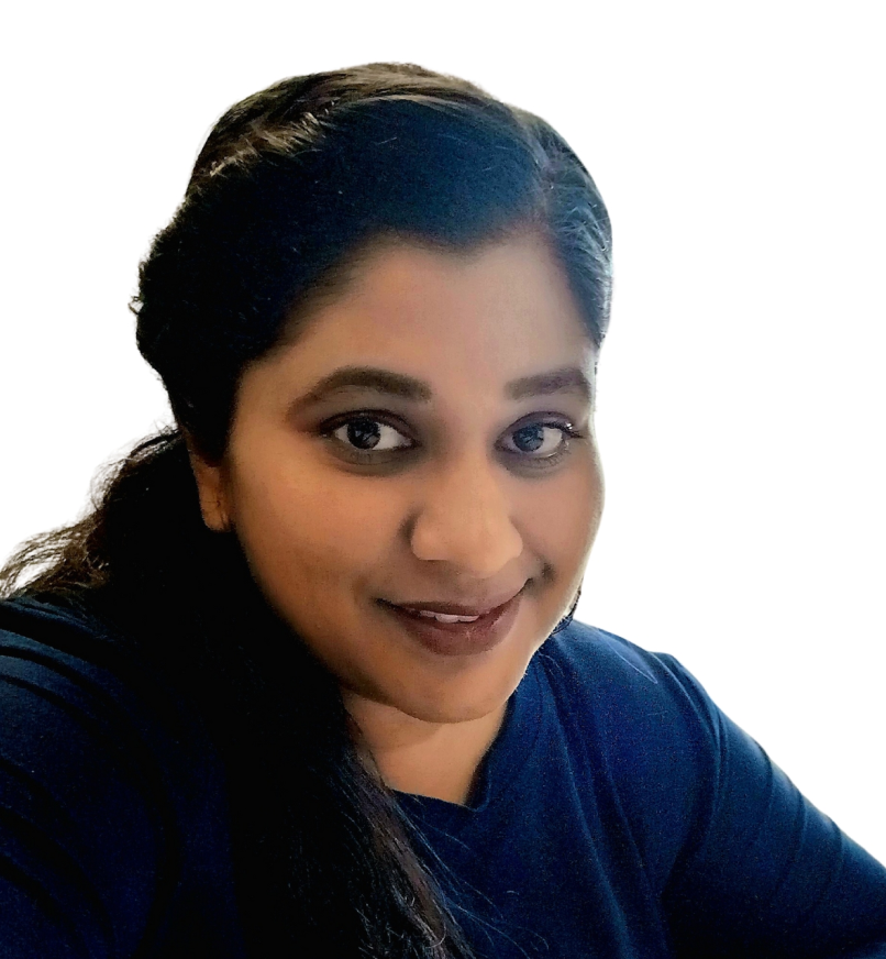 Smiling woman with long dark hair wearing patterned jacket over a black shirt.