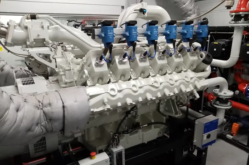 Large industrial gas engine with blue components.