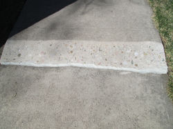 Completed Sidewalk Shaving & Caulk