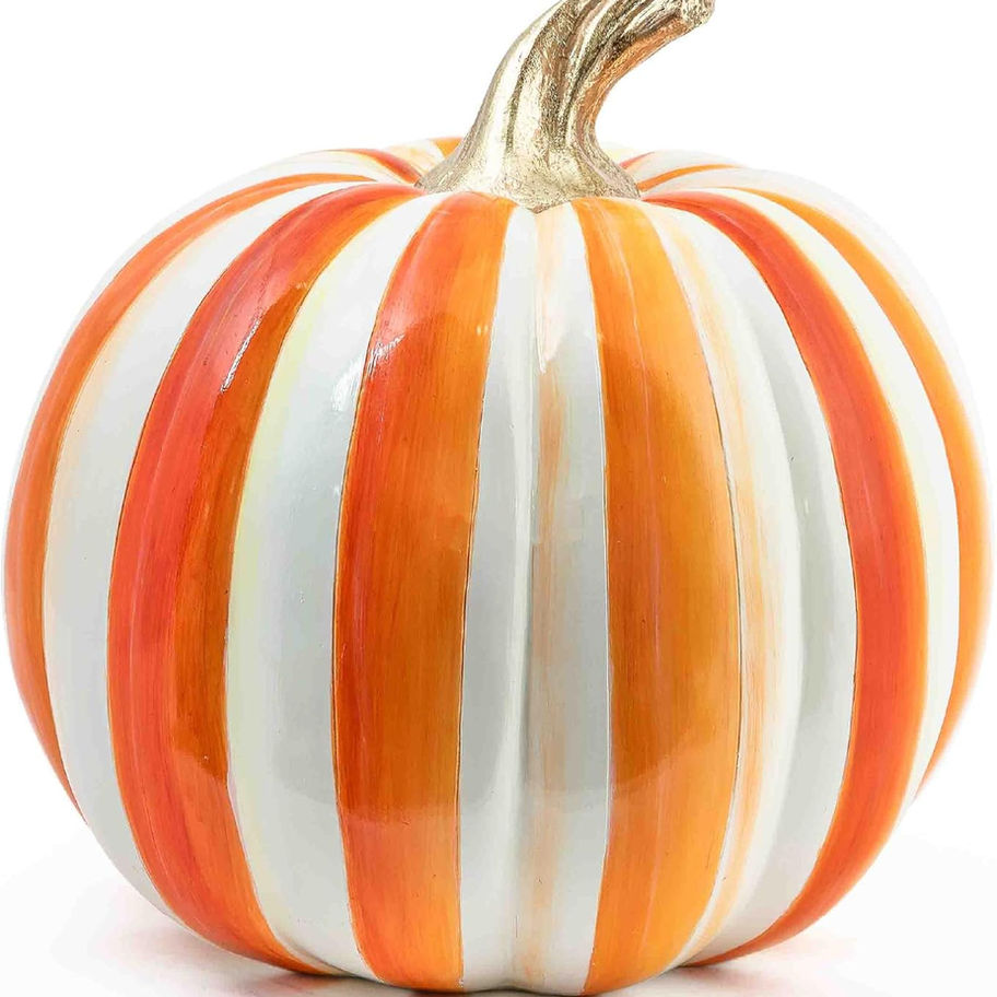 Decorative orange and white striped pumpkin with gold stem