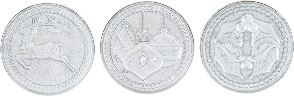 Silver coin with embossed Christmas ornaments and braided border