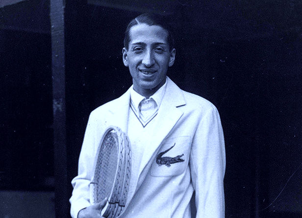 Photo of René Lacoste wearing crocodile logon on clothing