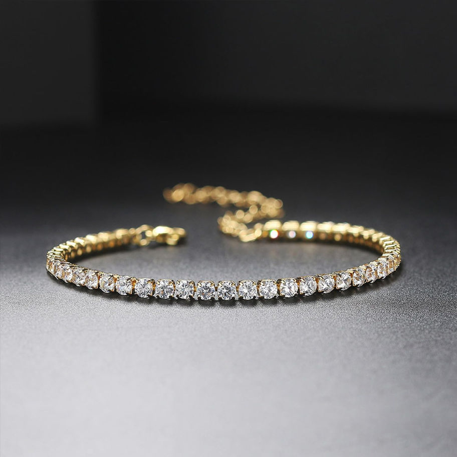 Gold bracelet with sparkling stones