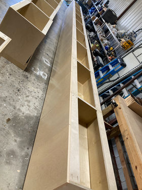 Reception desk for Crux south location. Commercial cabinets and architectural millwork by Welborn Woodworks