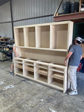 Beautiful custom millwork by Welborn Woodworks in Austin Texas. Custom base cabinet with glass panel hutch. Commercial and residential cabinets
