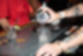A bartender pouring shots