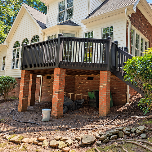 Wood fence and deck restored with fresh stain in Apex neighborhood