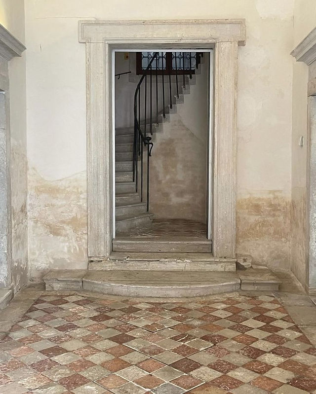 rustic italian staircase with tiling floor