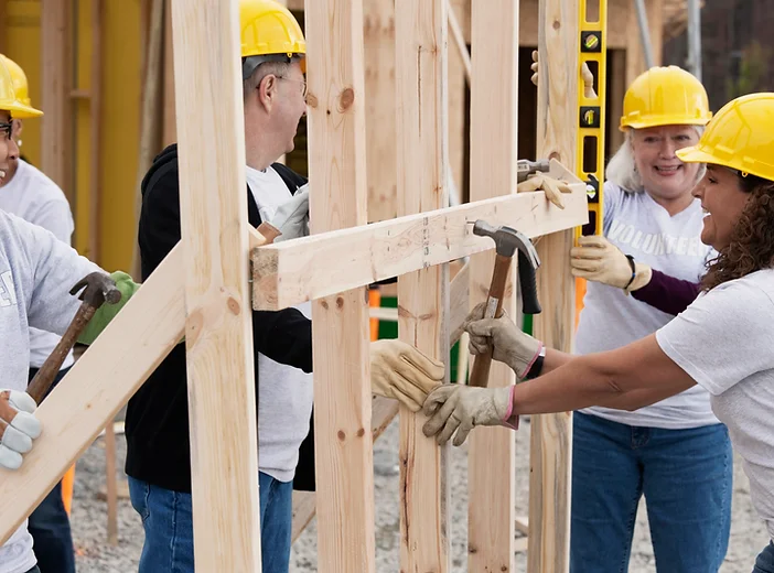 Volunteers on Construction Site