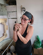 Katie holding a baby Turken chicken at Theis Evergreen Farm in Yorkville, IL