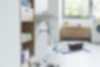 Leaking bathroom sink and plumber tools on the floor, plumbing service concept