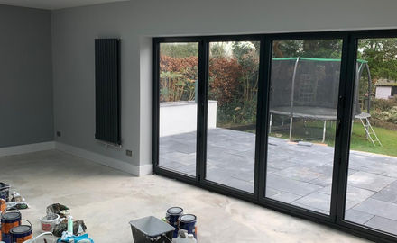 Kitchen extension filled with painting supplies