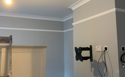 Priming walls ready to redecorate