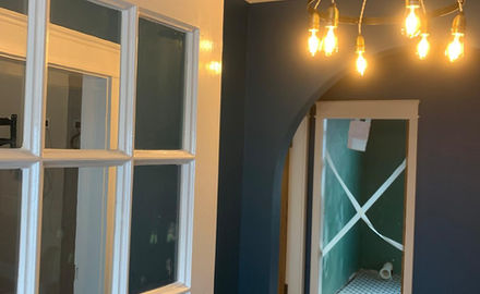 Hallway painted midnight blue