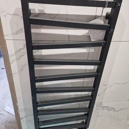 black shower rail installed