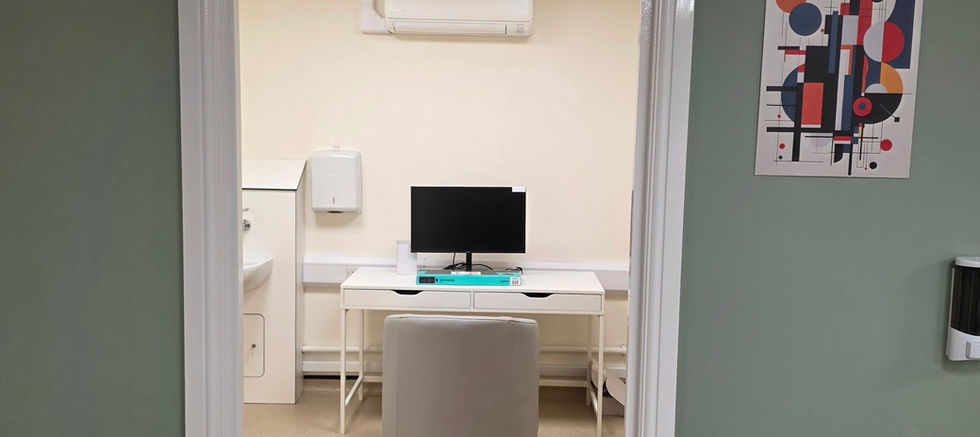 A hospital room featuring a desk
