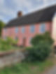 house exterior walls painted pink