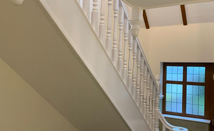 Freshly painted stairs and bannisters