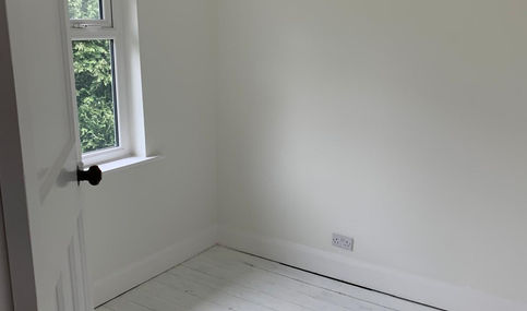 Room with painted walls and floors