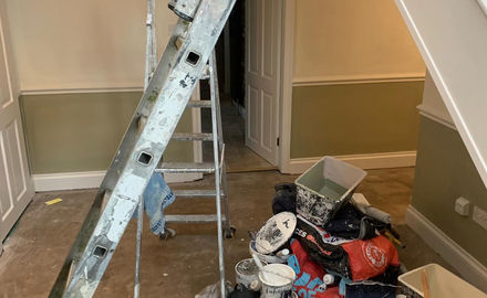 Painting equipment in hallway